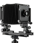 Photo of ARCA-SWISS F-Metric 4x5 View Camera with quartering view, featuring base tilt, ARCA-SWISS Micro-Orbix® tilt and folding monorail. From ARCA-SWISS USA. SKU: 013145-OC