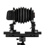 Photo of ARCA-SWISS F-Metric 6x9 View Camera with side view, featuring base tilt and ARCA-SWISS Micro-Orbix® tilt. From ARCA-SWISS USA. SKU: 013169-OC