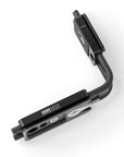 Photo of ARCA-SWISS L-Bracket Classic Universal. Facilitates quick change in orientation while keeping the camera centered over the tripod head. Two sliding plates - one long camera base plate and one short vertical arm plate, both with quick release locking levers. Universal design for use with Canon, Nikon and Fuji GFX 505 cameras. Anti-twist pin with pinhole registration positions. From ARCA-SWISS USA. SKU: 802306