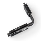 Photo of ARCA-SWISS L-Bracket Classic Universal. Facilitates quick change in orientation while keeping the camera centered over the tripod head. Two sliding plates - one long camera base plate and one short vertical arm plate, both with quick release locking levers. Universal design for use with Canon, Nikon and Fuji GFX 505 cameras. Anti-twist pin with pinhole registration positions. From ARCA-SWISS USA. SKU: 802306