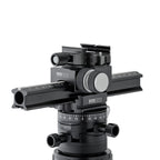 Photo of ARCA-SWISS Macro-Table geared macro focusing rail mounted on Core 60 tripod head . Versatile and portable. Made with ARCA-SWISS modular view camera components. Micro-metric, self locking, gear-driven movements. Inner friction control ring. Quick release can be manually rotated 90°. Also useful as a nodal rail for improved panoramic interval capture. From ARCA-SWISS USA. SKU: 802336