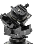 Photo of ARCA-SWISS C1 Cube cp geared tripod head with Classic quick release, showing C1 Cube cp mounted on a tripod, 3/4 front view. Featuring gear-driven, self-locking micro-metric controls. From ARCA-SWISS USA. SKU: 8501503.1