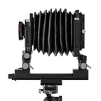 Photo of ARCA-SWISS F-Metric Field C 4x5 View Camera with side view, featuring base tilt, ARCA-SWISS Micro-Orbix® tilt and folding monorail. From ARCA-SWISS USA. SKU: 013545-OC