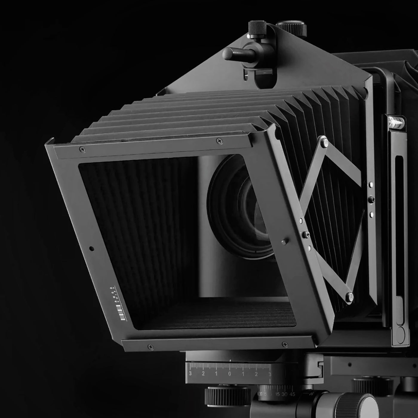Arca-Swiss multi-format compendium hood installed on an F-Metric view camera to shade a lens from stray light.