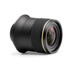 ARCA 30 mm black lens with gold band  viewed on its side showing front element and filter ring.