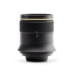 ARCA 30 mm lens, standing on a white background, showing the focus ring and 3m to infinity distance scale.