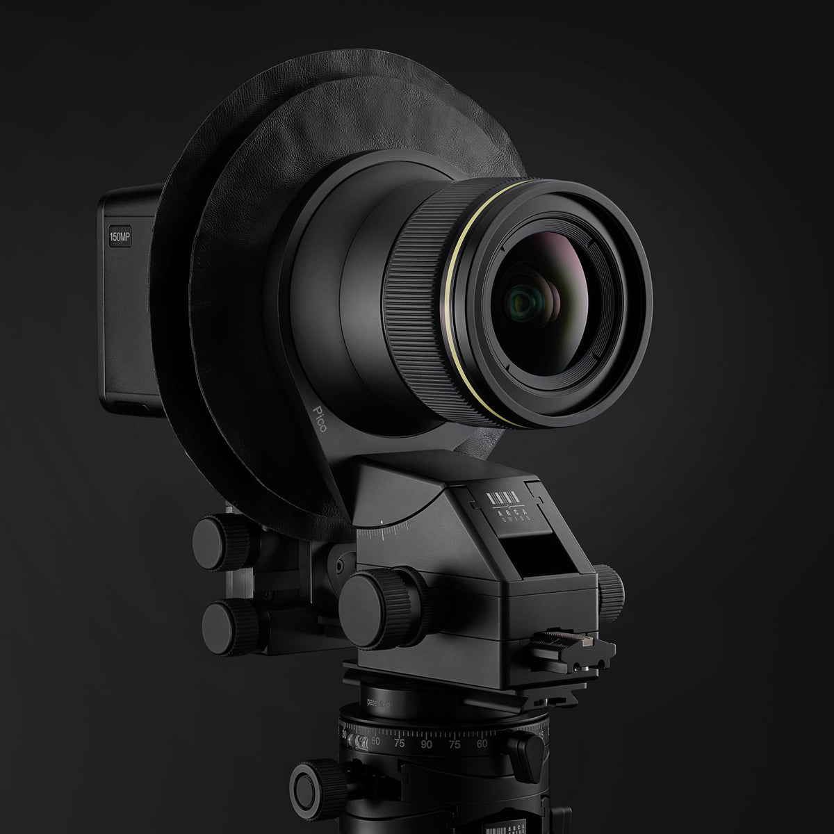 A Pico view camera with ARCA 30 lens, attached to Core 75 geared tripod head, shown against a dark studio background.
