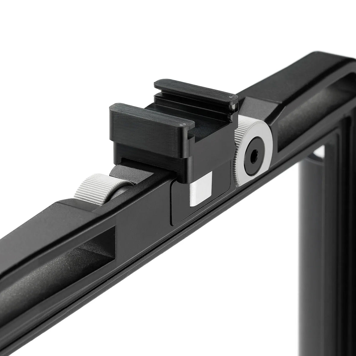 Closeup of ARCA-SWISS cold shoe installed on the top of an F-line view camera front frame.