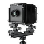 Photo of ARCA-SWISS F-Metric 4x5 View Camera with quartering view, featuring base tilt, ARCA-SWISS Micro-Orbix® tilt and folding monorail. From ARCA-SWISS USA. SKU: 013145-OC