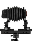 Photo of ARCA-SWISS F-Metric 6x9 View Camera with side view, featuring base tilt and ARCA-SWISS Micro-Orbix® tilt. From ARCA-SWISS USA. SKU: 013169-OC