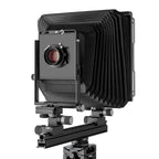 Photo of ARCA-SWISS F-Metric 8x10 View Camera with quartering view, featuring telescopic optical bench, base tilt and ARCA-SWISS Micro-Orbix® tilt. From ARCA-SWISS USA. SKU: 013181-OC