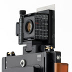 Photo of ARCA-SWISS VarioFinder II. Optical viewfinder for previewing image compositions. Allows for choosing a lens, evaluating compositions, and visualizing with rise/fall and shift movements before setting up camera. From ARCA-SWISS USA.  SKU:  0161008
