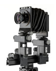 Photo of ARCA-SWISS M-Monolith 6X9 View Camera with quartering view, featuring tri-axial yaw-free movements, telescoping optical bench, base tilt and and ARCA-SWISS Micro-Orbix tilt. SKU: 014169