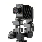Photo of ARCA-SWISS M-Monolith 6X9 View Camera with quartering view, featuring tri-axial yaw-free movements, telescoping optical bench, base tilt and and ARCA-SWISS Micro-Orbix® tilt. From ARCA-SWISS USA. SKU: 014169-OC